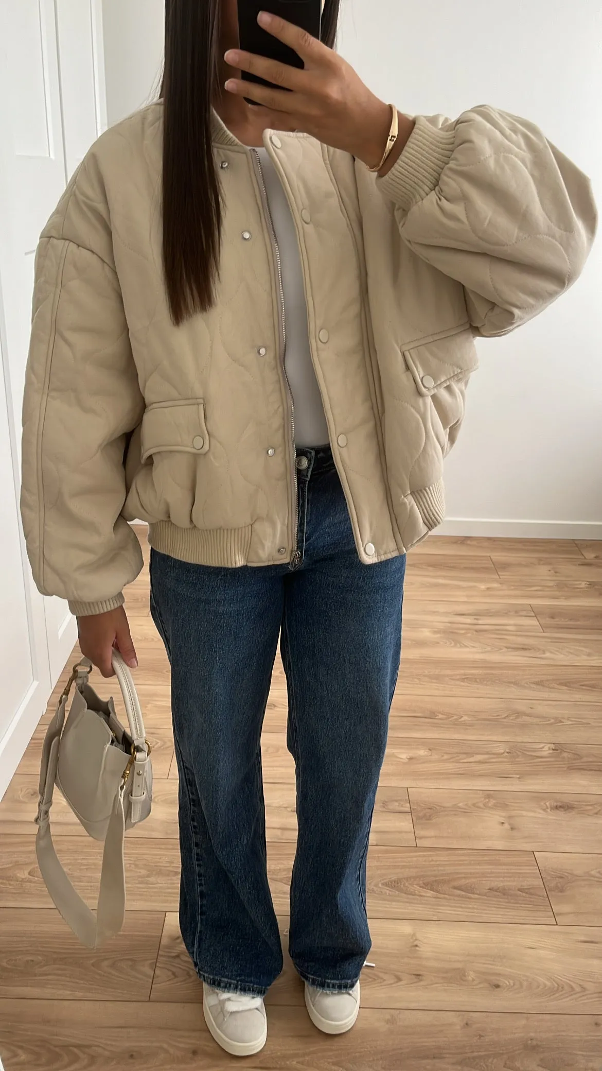 Beige quilted bomber jacket