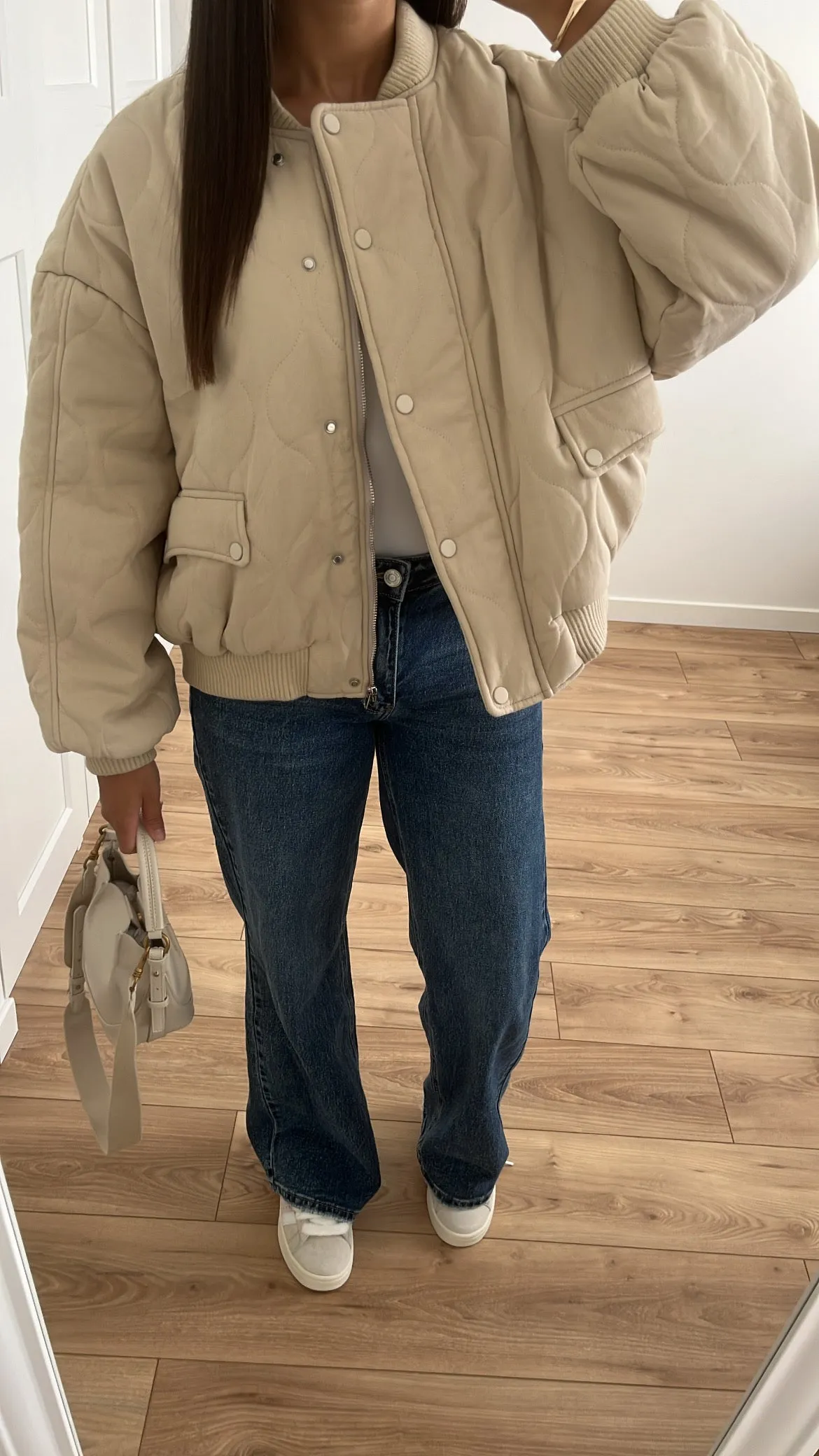 Beige quilted bomber jacket