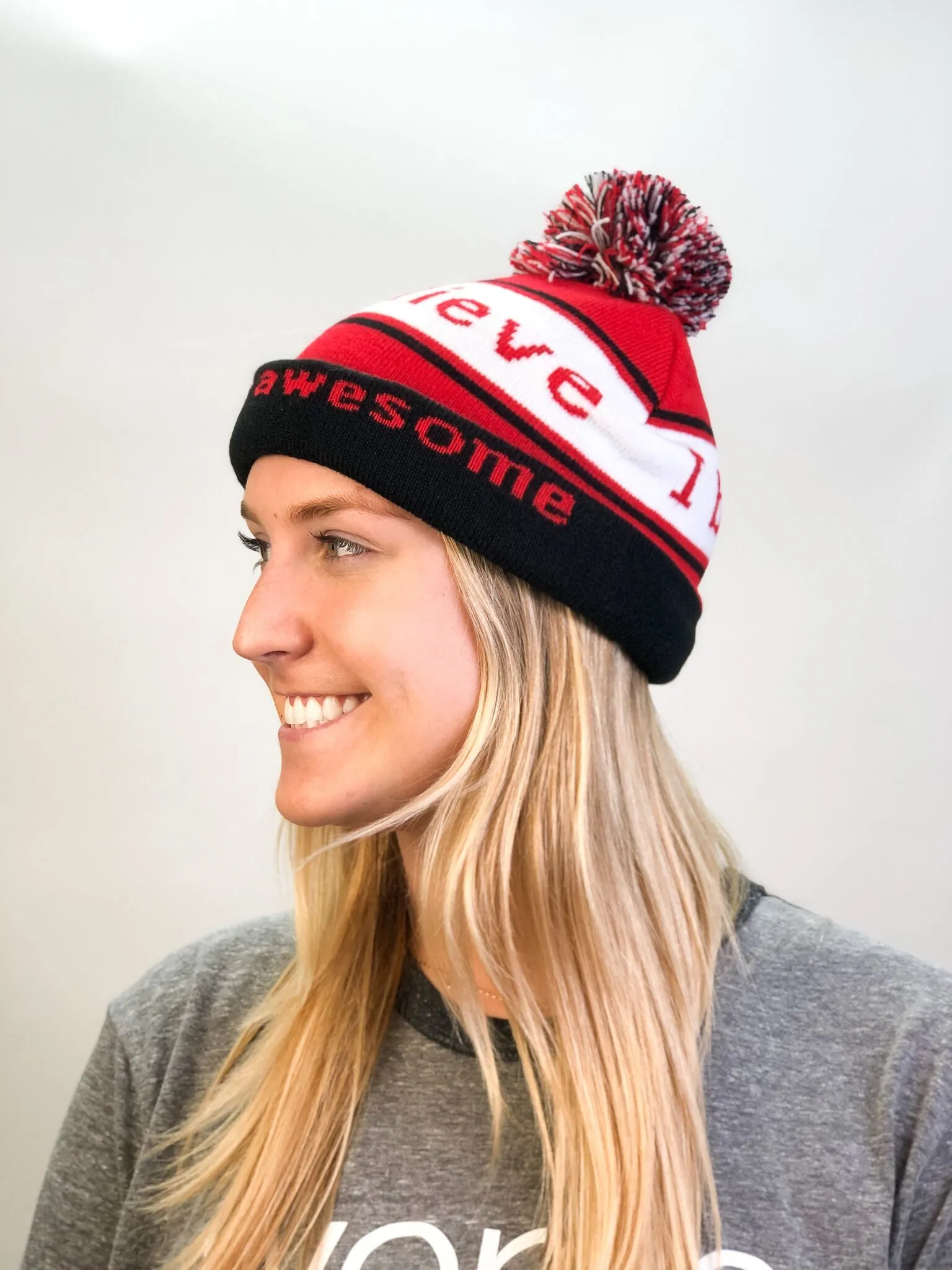 I believe™ red & black knit beanie with We are awesome™ on inside cuff