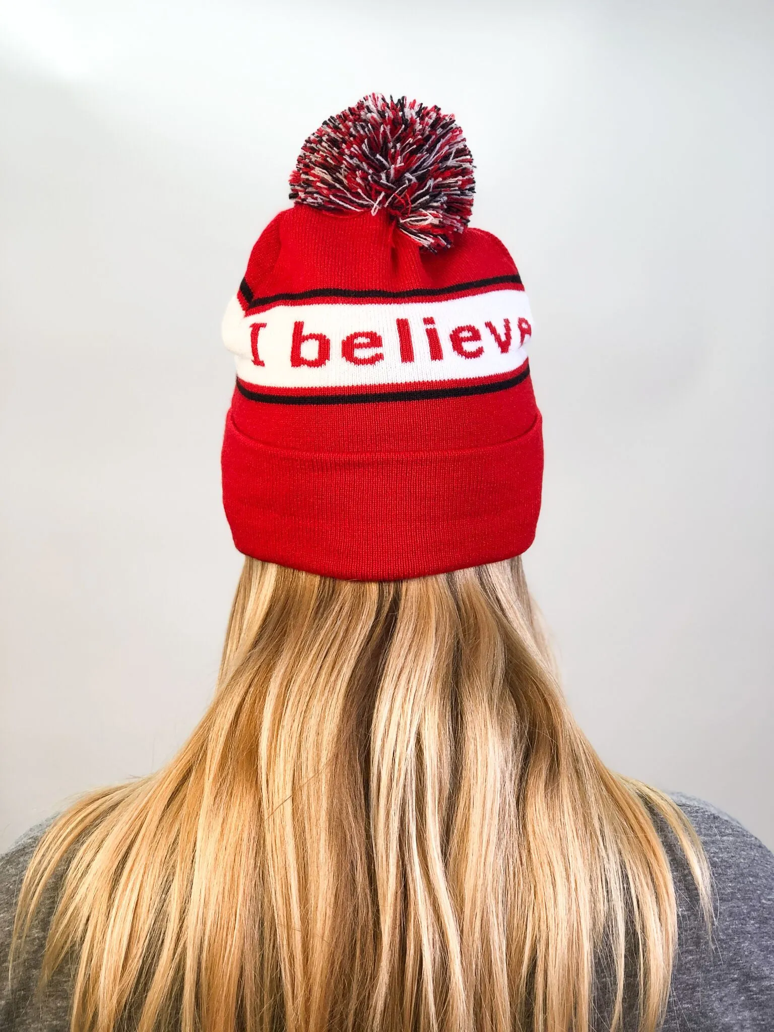 I believe™ red & black knit beanie with We are awesome™ on inside cuff